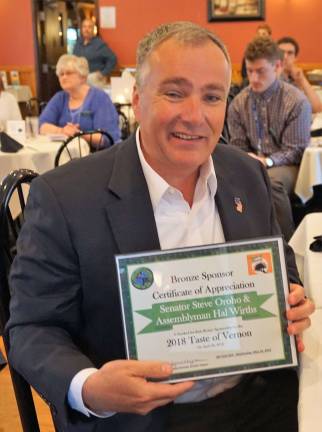 PHOTOS BY VERA OLINSKI N.J. Assemblyman Hal Wirths receives a Taste of Vernon sponsor certificate of appreciation, also on behalf of N.J. Senator Steve Oroho.