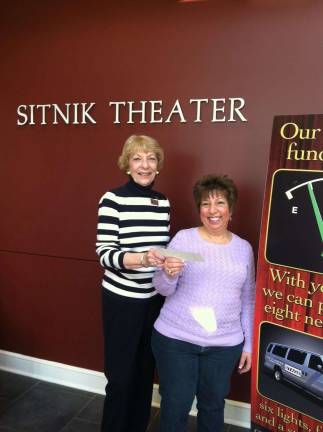 Centenary Stage Co. advisory board member Joanne Riley, left, is shown with raffle winner Donna Mappa, who won $3,150 in a the company's 50/50 raffle.