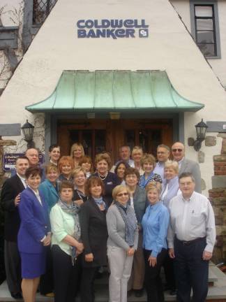 Employees of the Coldwell Banker Sparta office participated in the 2013 'Go Blue for CASA' event to raise awareness for children who are victims of abuse and neglect during April’s National Child Abuse Awareness and Prevention Month.