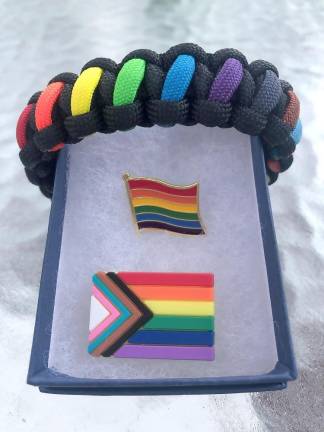 Pride pins and wristlet (Photo by Frances Ruth Harris)