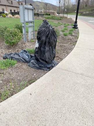 A black plastic bag covers an inactive fire hydrant (Photo provided)