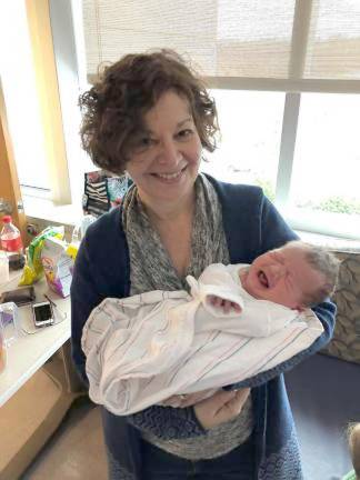 Tina Rowan holding grandson Jackson in this 2018 photo (File photo by Laurie Gordon)