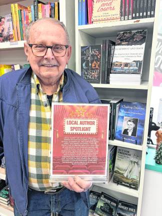 <b>Branchville author William Bathgate poses for a photo.</b>