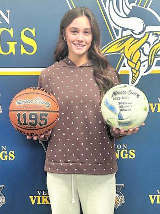 <b>Senior Monica Curry displays her new athletic milestones. She set new school records in basketball and soccer.</b>