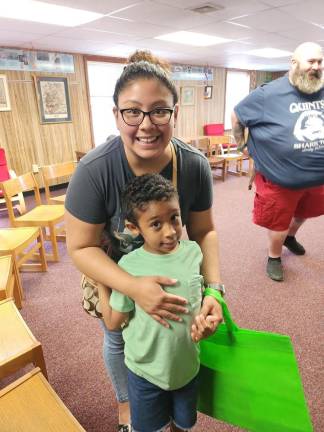 Hardyston residents Damaris Smith and het son, Bryce, visited the Franklin library branch Saturday, June 24 for the opening of the summer reading program.