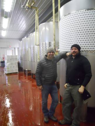 Photo by Alexis Tarrazi Warwick Valley Winery Co-owners Jeremy Kidde and Jason Grizzanti inside the Doc's Draft distillery in Pine Island.