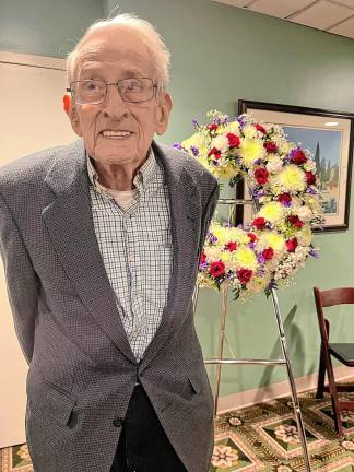 Ray Fein, 98, served in the Navy during World War II. He now lives at the Bristol Glen retirement community in Newton. (Photos provided)