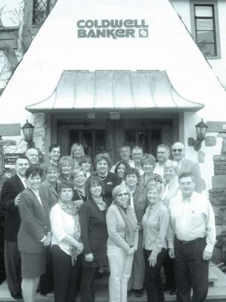 Employees of the Coldwell Banker Sparta office participated in the 2013 'Go Blue for CASA' event to raise awareness for children who are victims of abuse and neglect during April’s National Child Abuse Awareness and Prevention Month.