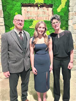 <b>Senior Elizabeth Peek represented Vernon at the annual Pass it Along Scholar Athlete Ceremony at Perona Farms. Pictured with Elizabeth are Head Coach Matt Sorensen (volleyball) and Kerry Ludeking (softball).</b>