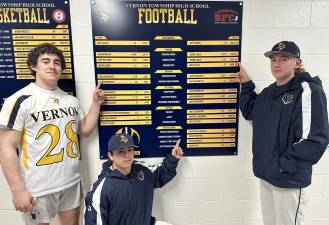 Vernon Township High School senior Gage Moskovitz, left, has the school record for rushing yards and touchdowns for a season and a career. Sophomore Matt Baumann, center, has the record for special teams tackles for a season. And senior Derek Lazier holds the new record for career passing in completions and total yards and he is tied for the record in passing touchdowns in a season. (Photo provided)