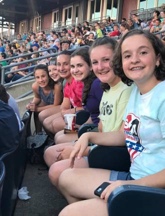 Kate King, second from right, attends a Sussex County Miners game with her friends when they were younger. (Photo provided)