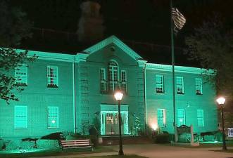 Pike County Administration Building illuminated green