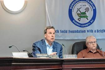 Franklin’s borough attorney, John Ursin, speaks during the Borough Council meeting April 8. At right is Mayor John Sowden IV. (Photo by Dave Smith)