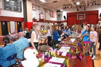 <b>Businesses run by fifth- through eighth-graders sell items in the TREP$ Marketplace on March 19 at Frankford Township School. (Photos by Maria Kovic)</b>
