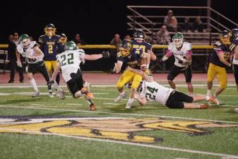 VF1 Vernon ball carrier Logan Pych is caught by a Sussex Tech defender. Pych ran for 211 yards and scored three touchdowns. (Photos by George Leroy Hunter)