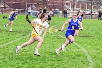 <b>Vernon’s Audra Leiter is on the move with the ball. She scored one goal in the game against Kittatinny on April 3. The Vikings won, 7-5. (Photos by George Leroy Hunter)</b>