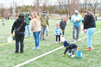<b>Children pick up eggs along the Easter Egg Trail at Maple Grange Park in Vernon. The annual event from moved to Sunday, April 13 because of the snowy weather a day earlier. (Photos by Maria Kovic)</b>