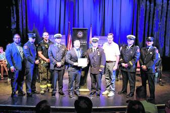 <b>Gottheimer presents awards to local heroes and their families.</b>