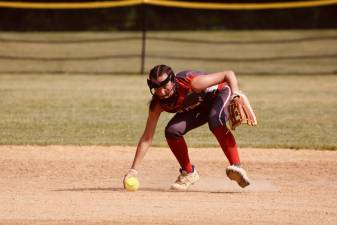 HP1 High Point freshman Joelle Lucatorto scoops up the ball in the game against Jefferson on Friday, June 2. (Photos by Jay Vogel)