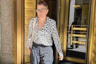 Christine Hunsicker, former chief executive of fashion startup CaaStle, leaves Manhattan federal court in New York on Friday, July 18. (AP Photo/Larry Neumeister)