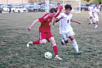 High Point and Newton players pursue the ball during a soccer game Sept. 12 in Sussex. The Braves won, 2-1. (Photos by George Leroy Hunter)