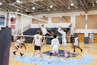 Vernon's Ben Jurewicz reaches for the ball in the game against Sparta on Thursday, April 18. The Vikings won 25-14, 25-14. (Photos by George Leroy Hunter)