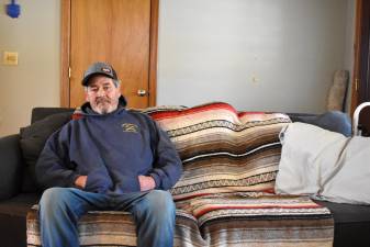 Timothy McCarty, 64, at home in Milford, Pa. the day before his bladder surgery — which was not covered by his insurance because it was across a state line in New York.
