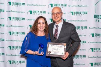 Keren Gonen receiving award from Geoff Green, President, Green Team Realty. Photo provided by Green Team Realty.