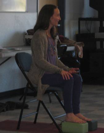 PHOTOS BY JANET REDYKE Certified chair yoga instructor Julie Lain begins class at the Sussex- Wantage Library.