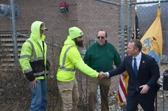 Rep. Josh Gottheimer, D-5, right, greets Vernon Department of Public Works employees Feb. 6. (Photos provided)