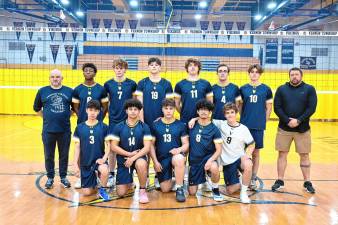 <b>Seniors Josh Jean and Caden Krzyzak, second and third from left in back row, respectively, are captains of the Vernon Township High School volleyball team. (Photo by Doug Miller)</b>