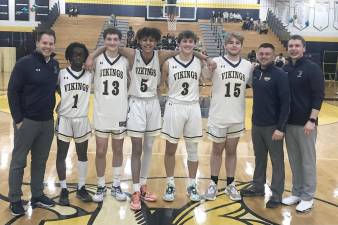 Members of the Vernon Township High School boys basketball team pose on Seniors Night. (Photo provided)