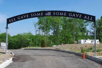 Just in time for Memorial Day, the Northern New Jersey Veterans Memorial Cemetery in Sparta received its crowning touch with an archway that reads, &quot;All Gave Some. Some Gave All.&quot;