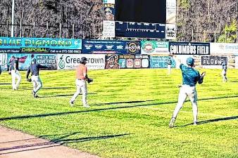 <b>Athletes warm up by playing catch before taking part in open tryouts for the Sussex County Miners in April 2024 at Skylands Stadium in Augusta. (File photo by Jay Vogel)</b>