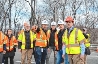 Gov. Phil Murphy, third from right; U.S. Transportation Secretary Sean Duffy, second from right; and Rep. Tom Kean Jr., right, survey sinkholes on Route 80 on Saturday, March 22. (Photo provided)