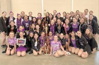 Dance Expression Dancers pose with the XCalibur Trophy at the Dance Xplosion National Dance Competition in Wildwood.