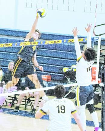 <b>Jefferson's Allan Czerwinski strikes the ball. Czerwinski had 13 kills, 2 blocks, 11 digs and 1 attack.</b>