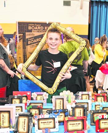 <b>Jaxon Wright from Frame It Up is shown.</b>