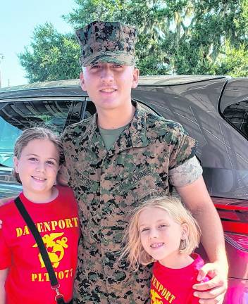 <b>Ethan Davenport is shown in the center.</b>