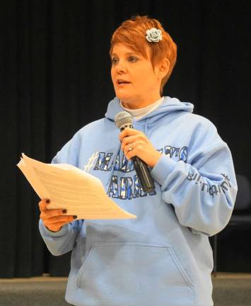 PHOTOS BY Dianne Grossman of Mallory's Army speaks at Glen Meadow Middle School.