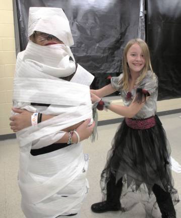 Photo by Viktoria-Leigh Wagner Isabella levens, 10, of Wantage is shown with a mummy made of toilet paper.
