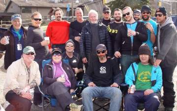 Host Ryan Mastrianni (front middle sun glasses) with the die-hard skiers and Mountain Creek&#x2019;s Joe Hession Sr. celebrate a great day of spring skiing at Mountain Creek South.