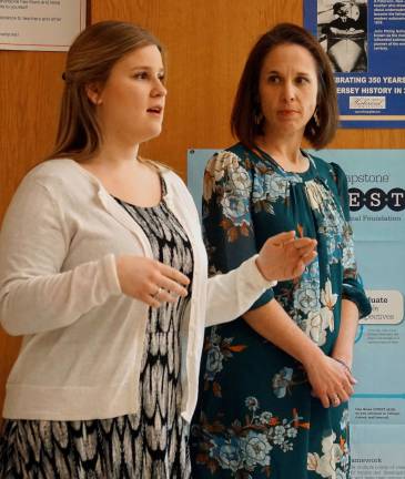 From left, Ann Yaccarino and Rebecca Sarno discuss their combined STEM unit project completed with Alex Gonzalez.