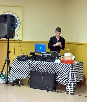 DJ Serge provided music and entertainment at the dinner.