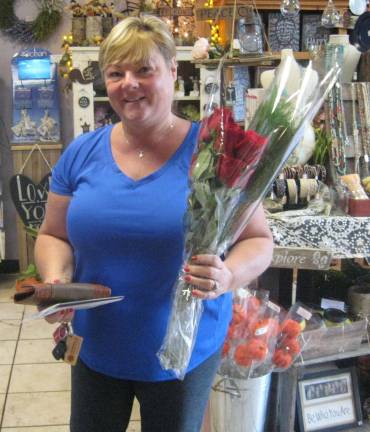 Lori Lenhart was lucky to receive her Good Neighbor bouquet on Tuesday September 11.