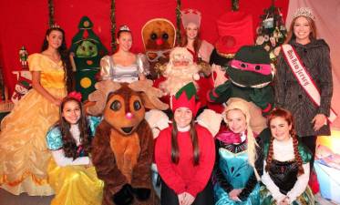 Santa and some of his friends in the &#x201c;Winter Wonderland&#x201d; at the Viking Village Tree Lighting