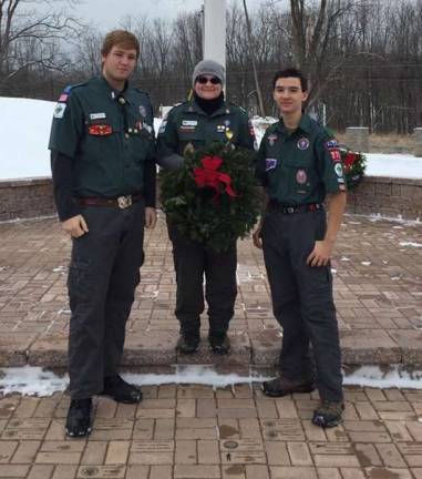 Scouts plant wreaths throughout county