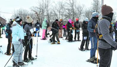 <b>Snowshoers are ready at the start of the event.</b>