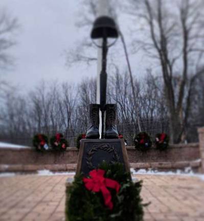 Scouts plant wreaths throughout county