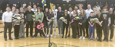 Senior players with parents and family.